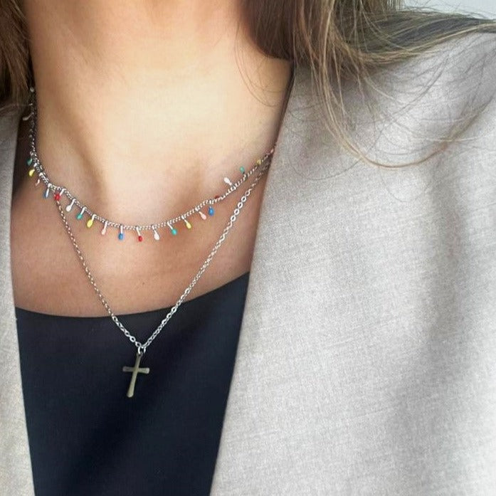 Collar cruz doble ráfaga colores plateada