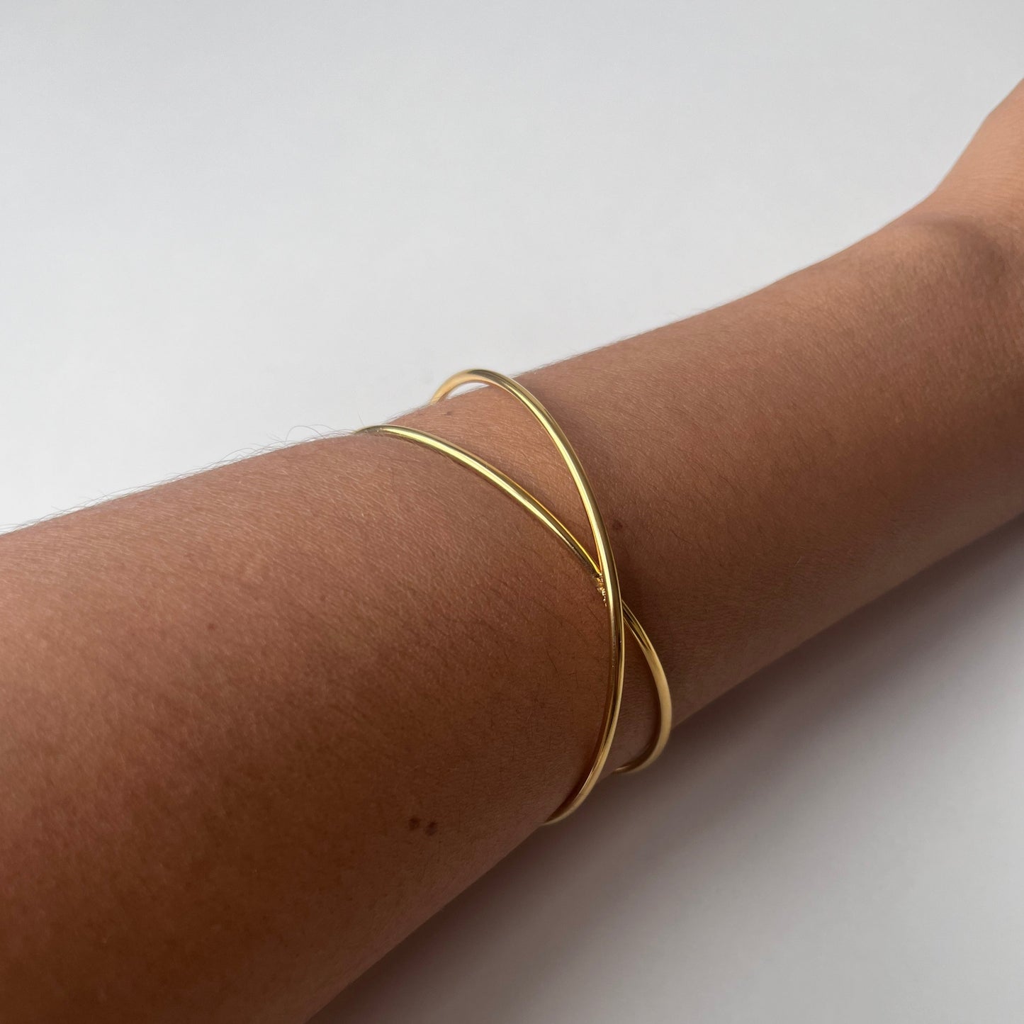 Brazalete Cruzado