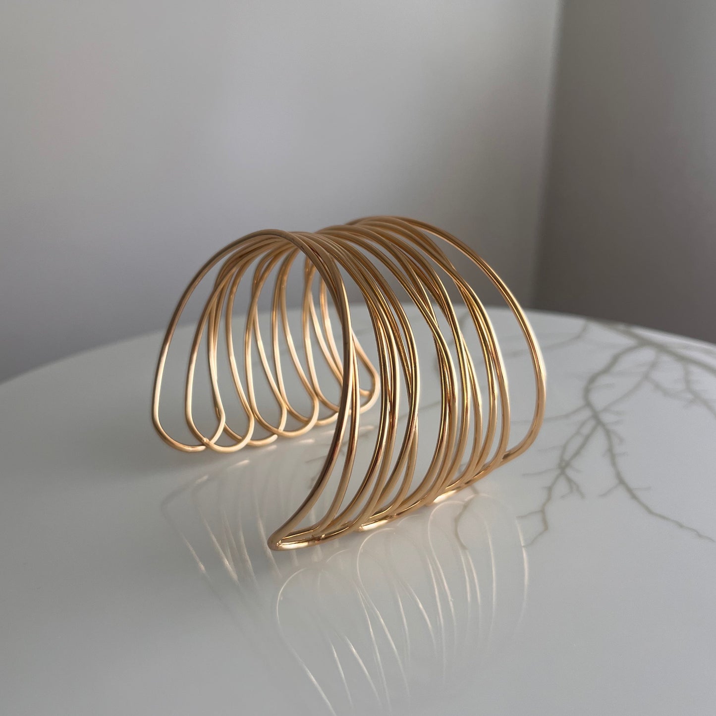 Brazalete Multilínea dorado