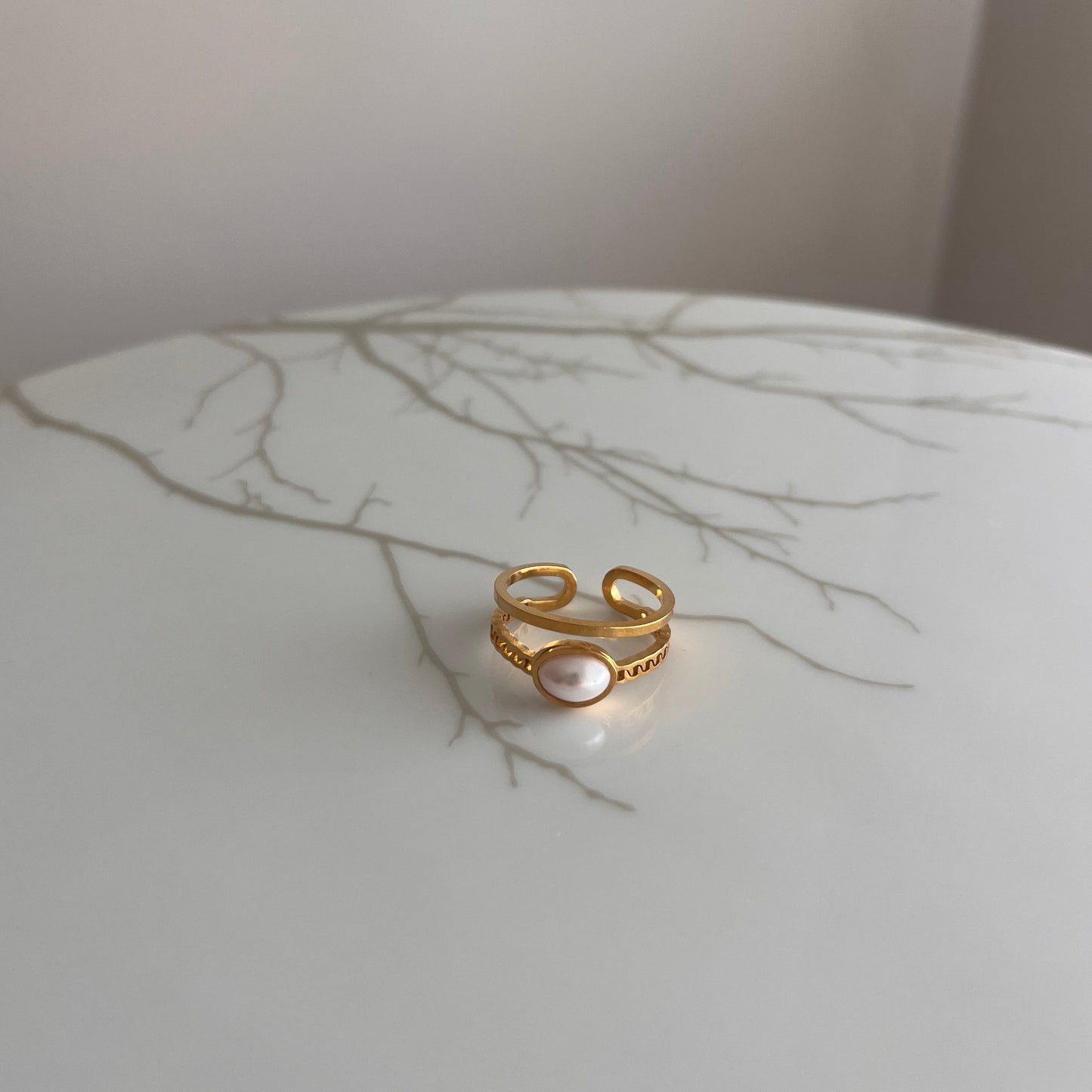 Anillo perla doble
