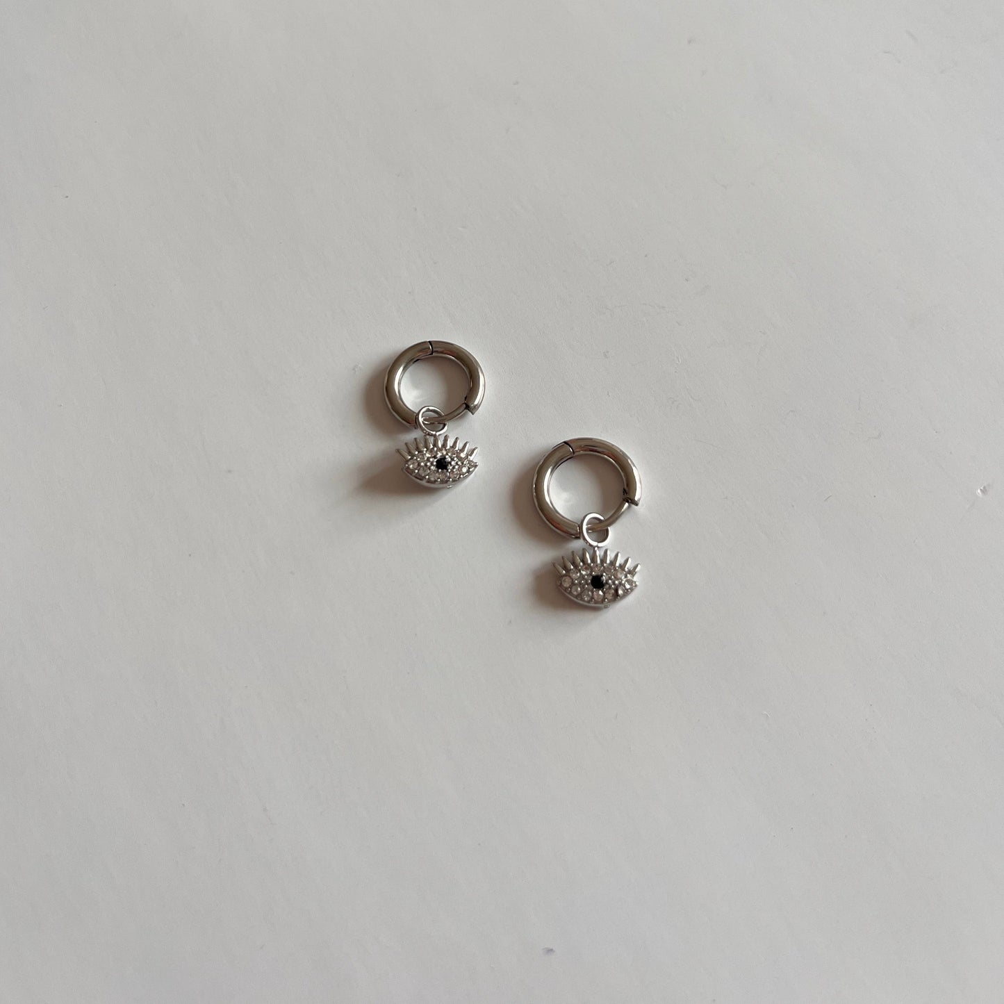 Pendientes aro ojo circonitas