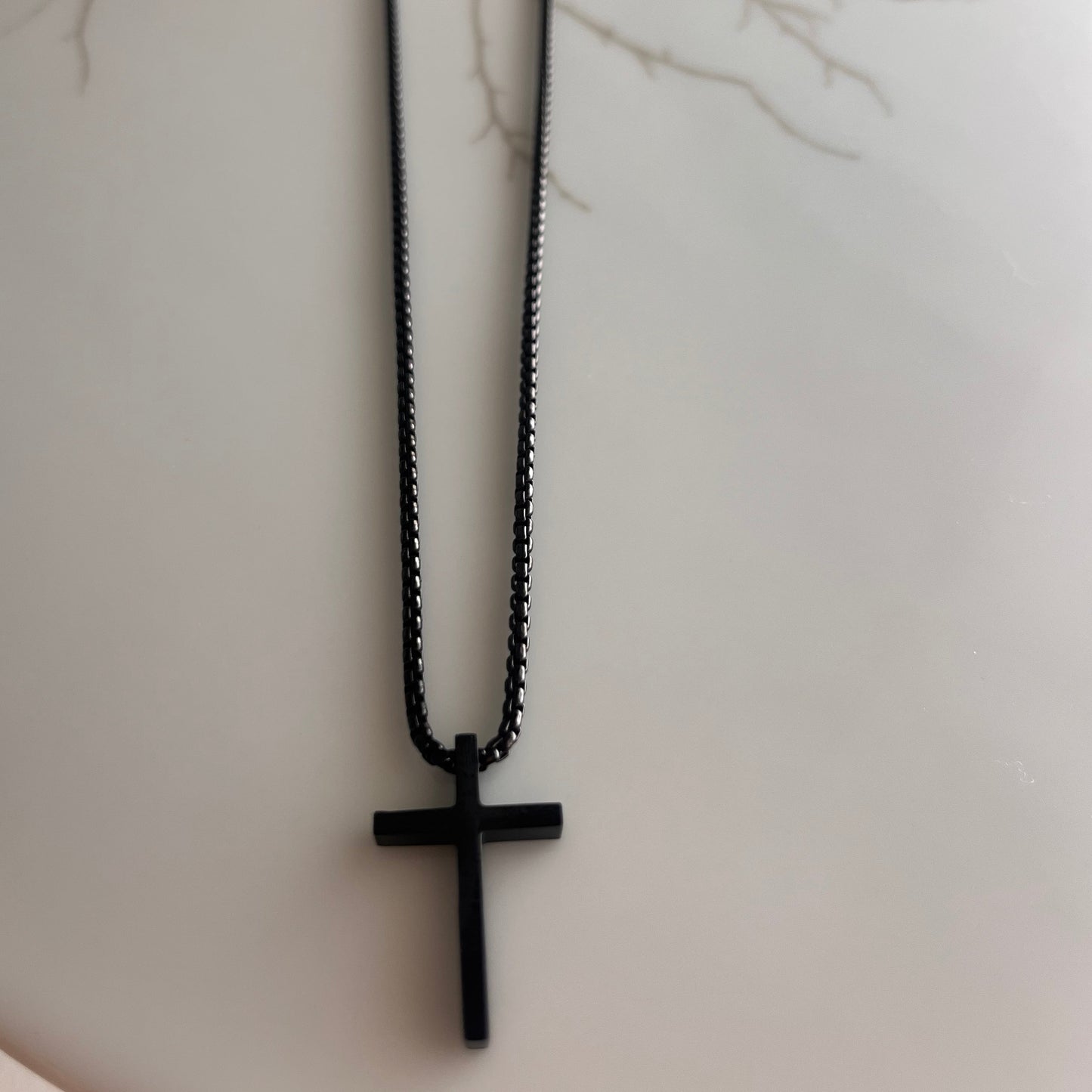 Cruz negra Man