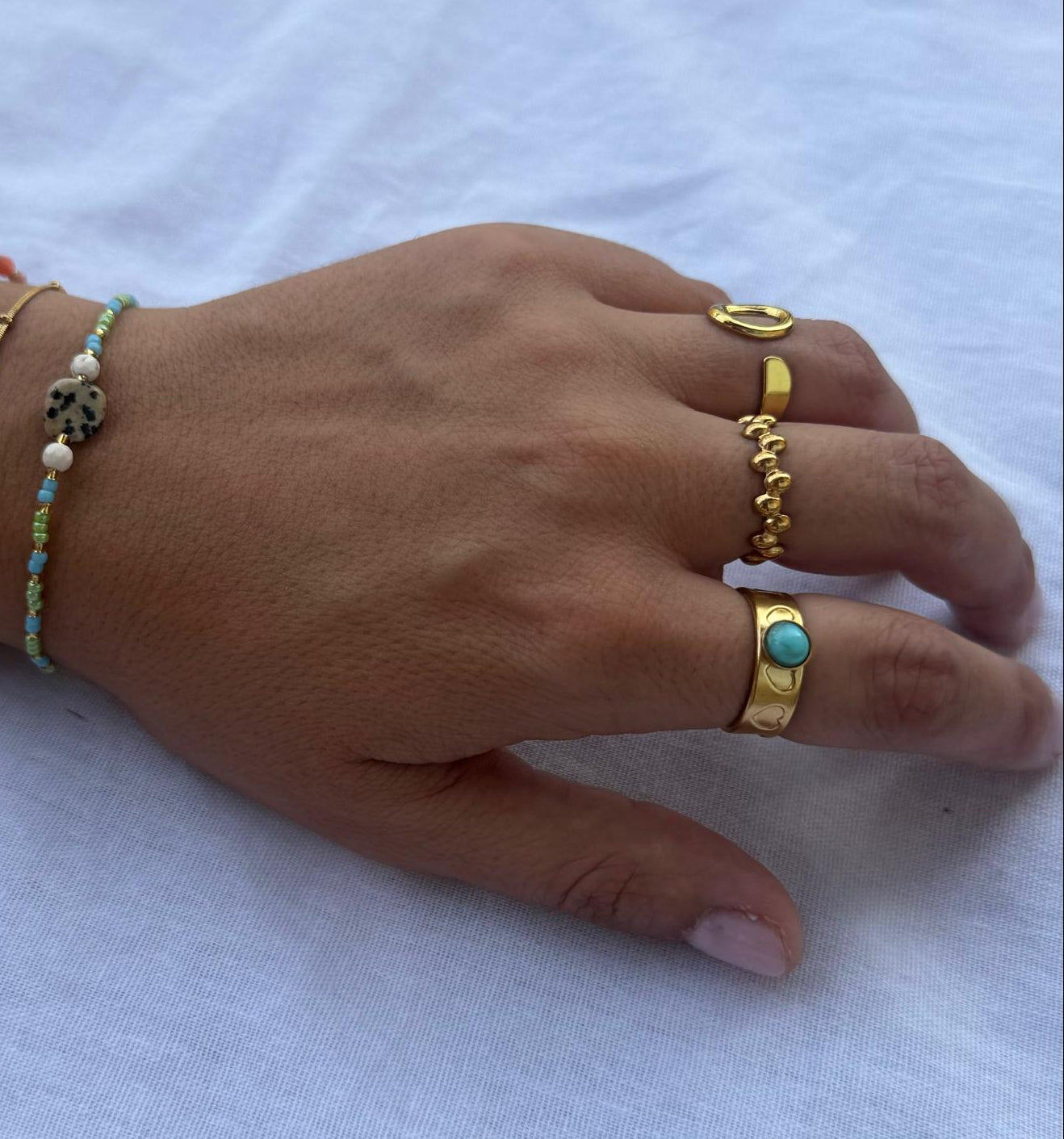 Anillo corazones piedra turquesa